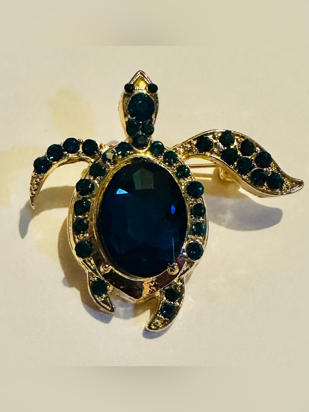 Gold-Tone Turtle Brooch with Deep Blue Gemstones